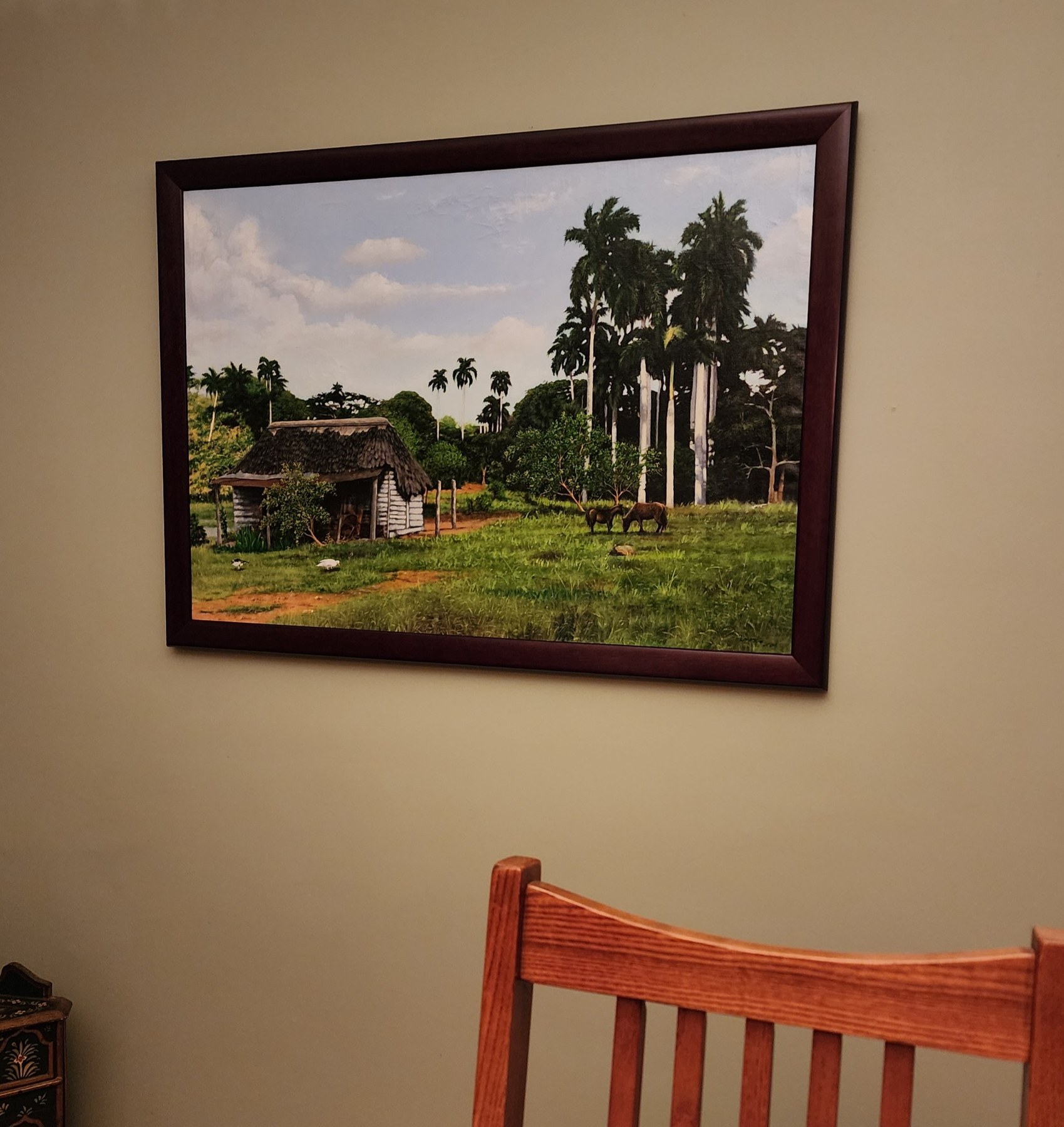 Eduardo Labrada painting in a private home